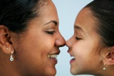 Mother and Daughter Eskimo Kiss